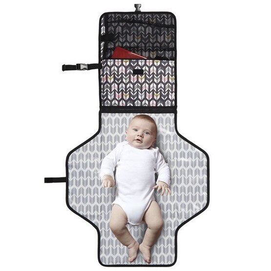 baby boy on skip hop changing station